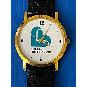Lutheran Brotherhood Wristwatch Gold tone watch w black band quartz